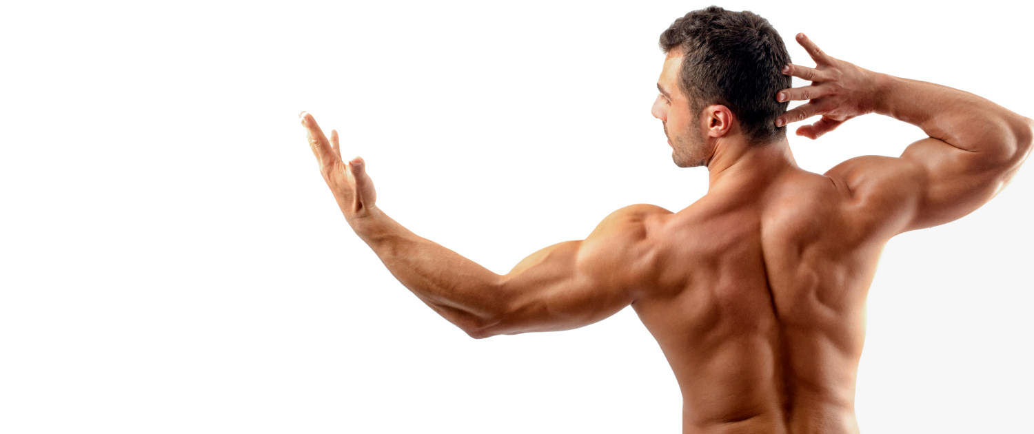 Fit man with a sunbed tan, posing